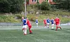 Lasse Øien i blått og Chris-Gøran Hansen i duell, to av veteranene i oppgjøret.