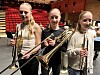 Marie Vardehaug og søstrene Lisa og Jenny Skjærvik Storsul synes korps er gøy og tar interessen et steg lenger.