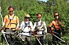 Her er de fire guttene som rydder skogen i Bjørndalen i sommer: Sander Leon Hansen Ulsund, Magnus Søndergaard Johnsen, Eduard Vasilenko og Benjamin Petersen. Med saga i hendene og guttastemning i laget sørger de for at framtidsskogen får vokse.