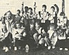 Stafettvinnere for Kolvereid idrettslag i Namsostafetten 1991: Trener Ole Krogstadmo med utøverne: Stig Olav Finne, Are K. Kristiansen, Per Olav Livik, Håvard Krogstadmo, Øyvind Jakobsen og Gaute Joar Sæterøy. Foran: Anita Arnøy, Maria Holmemo, Margareth Nordbøe, Linda Rønningen, Ann Karin Strøm og Monica Torgersen.