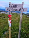 Rød stolpe plassert på Vattin, en av de fjerneste stolpene å nå.