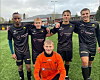 Yves Muhizi (19) Leander Johnsen (15), Teodor Kornerud (17) og Tobias Kornerud (17 med Iver Lauten (15) foran, viser at ungdommen bidrar for Kolvereid.